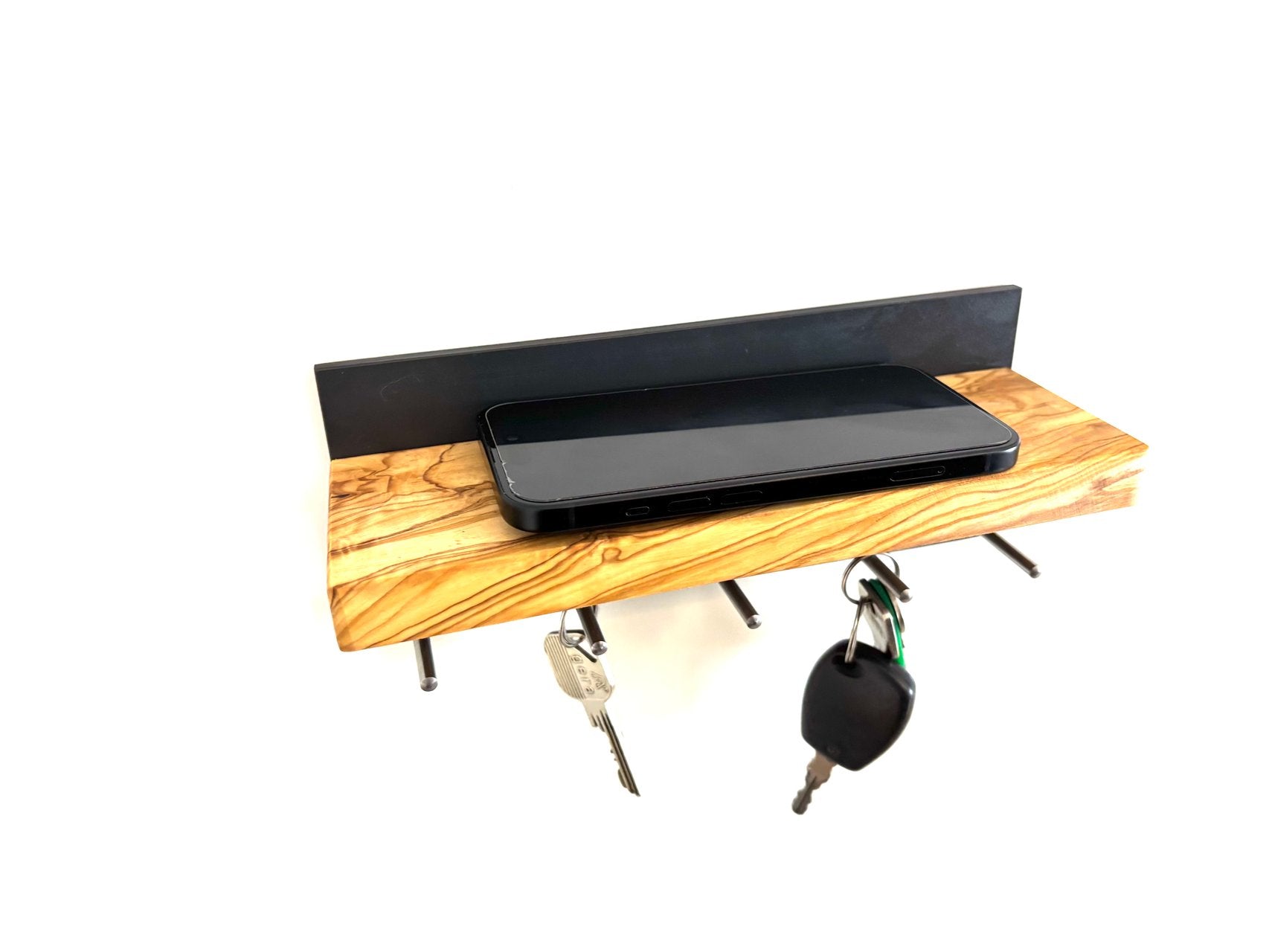 Keychain in the shape of a cross made of olive wood