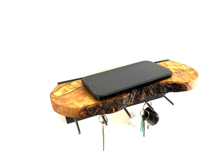 Keychain in the shape of a cross made of olive wood