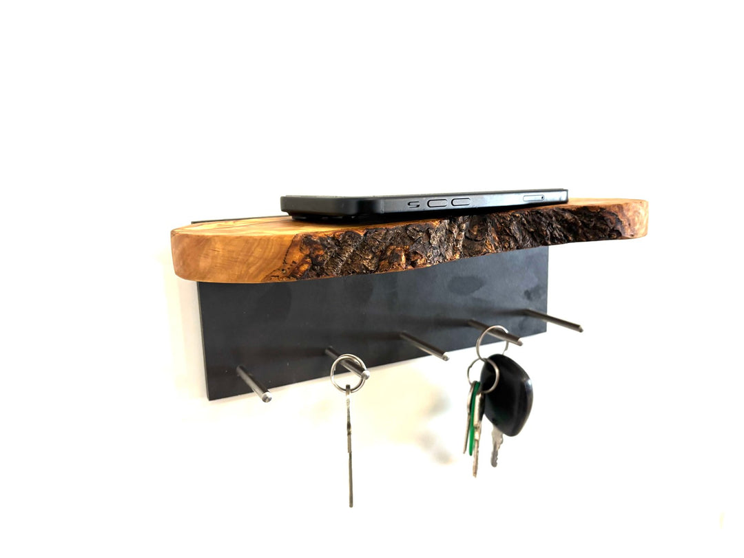 Keychain in the shape of a cross made of olive wood