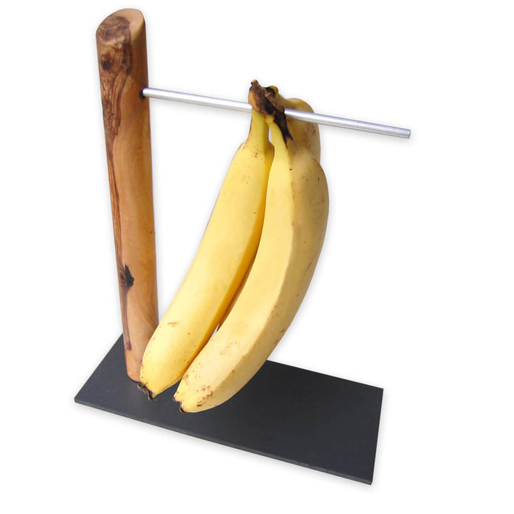 Obsthalter aus Olivenholz mit Bananen